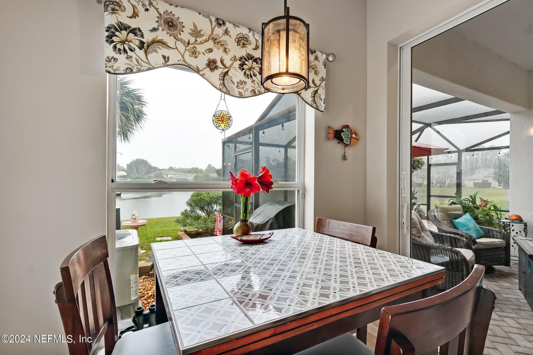 11230 Water Spring Circle Jacksonville, FL 32256 - Photo 21 of 91 a view of a dining room with furniture window and outside view