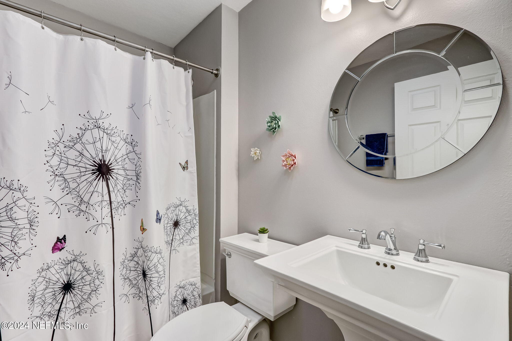 11230 Water Spring Circle Jacksonville, FL 32256 - Photo 32 of 91 a bathroom with a sink toilet and shower