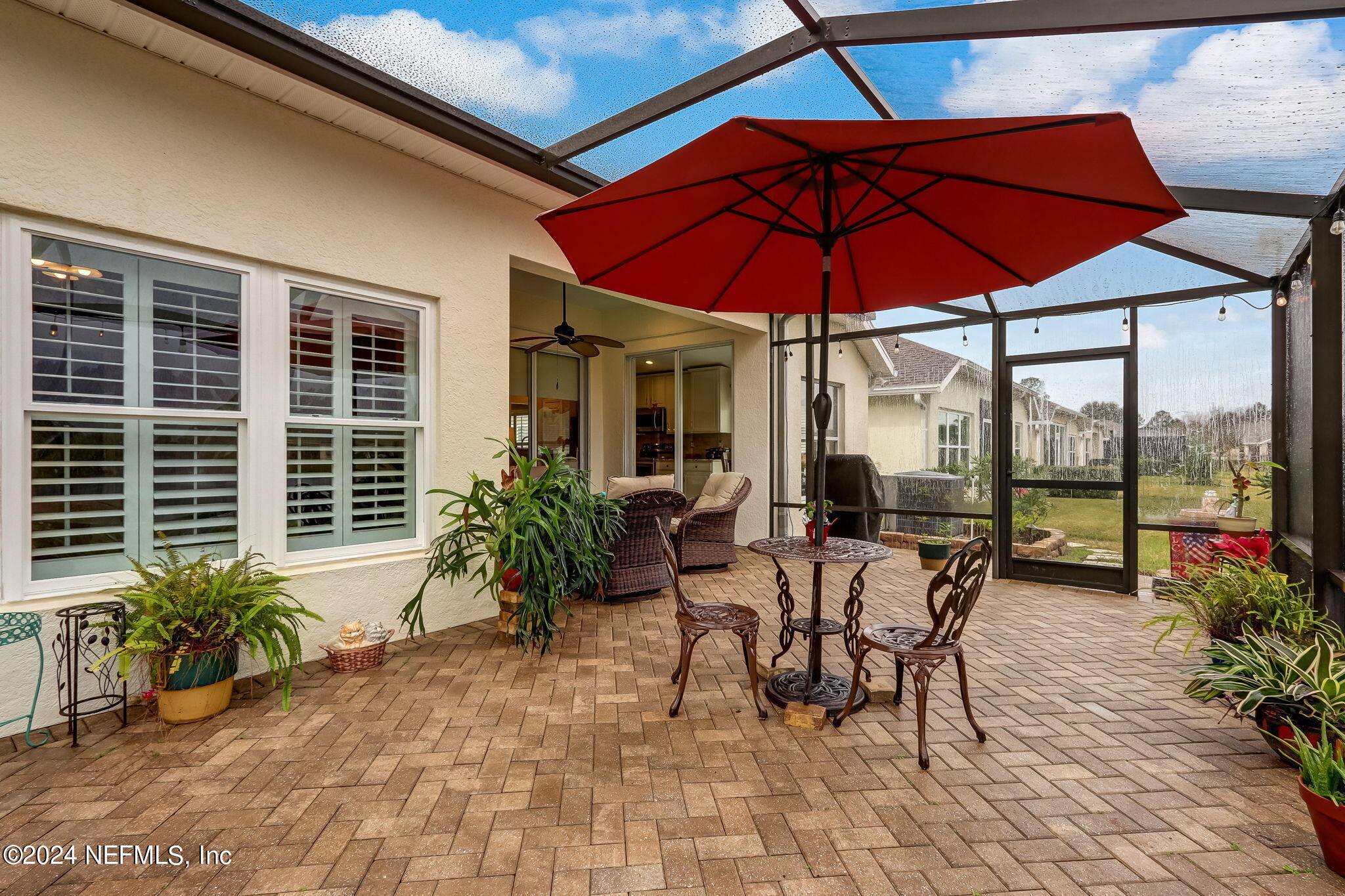 11230 Water Spring Circle Jacksonville, FL 32256 - Photo 39 of 91 a view of a backyard with sitting area and furniture
