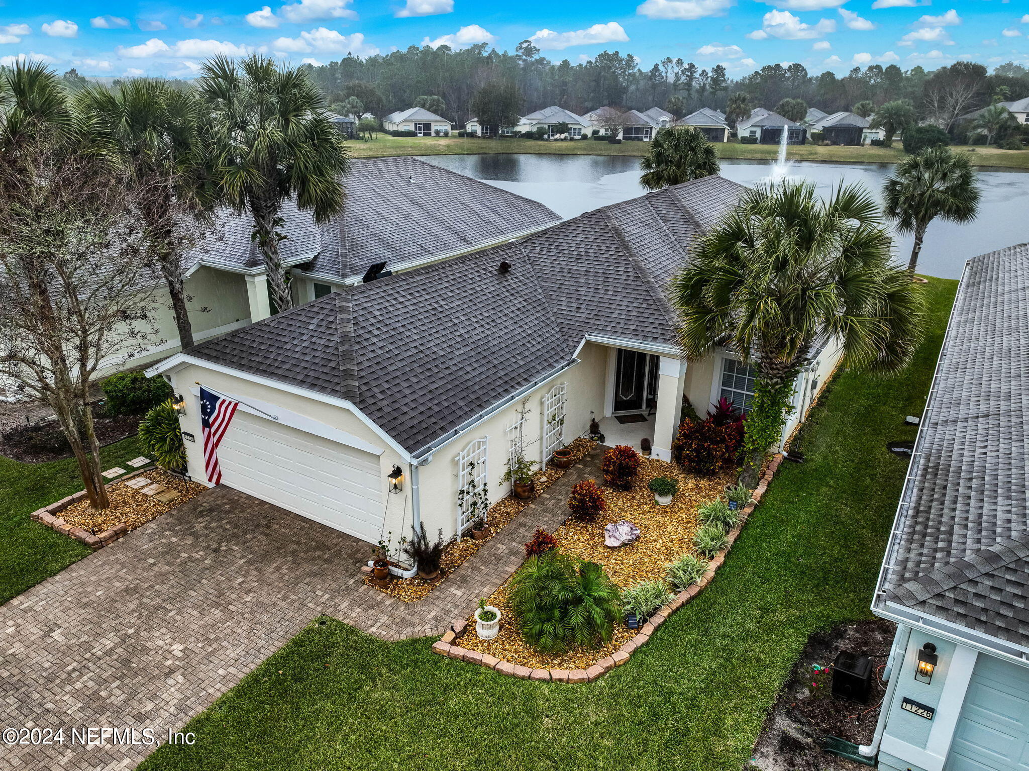 11230 Water Spring Circle Jacksonville, FL 32256 - Photo 46 of 91 an aerial view of a house having yard and lake view