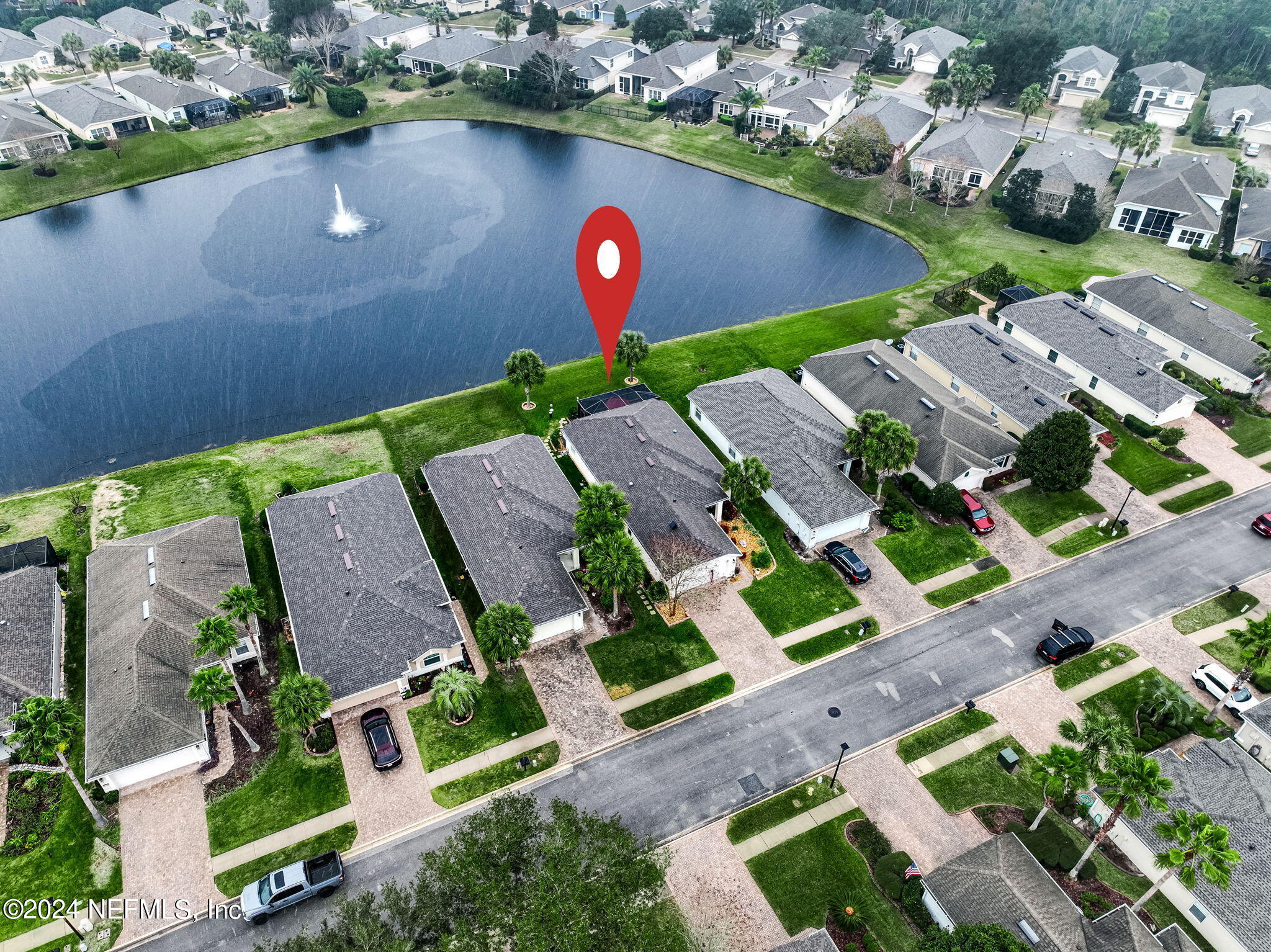 11230 Water Spring Circle Jacksonville, FL 32256 - Photo 52 of 91 an aerial view of a house with a garden and lake view