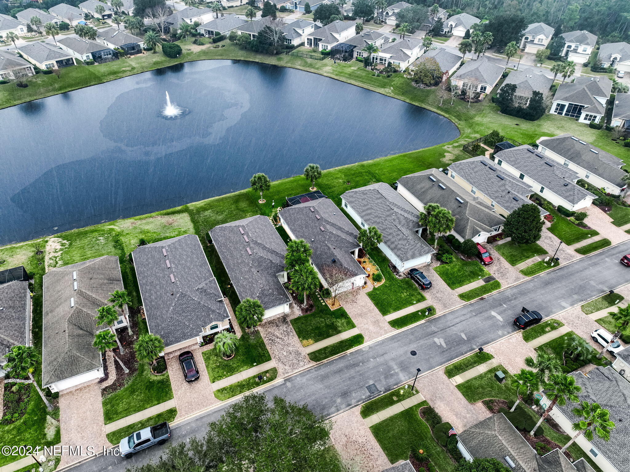 11230 Water Spring Circle Jacksonville, FL 32256 - Photo 53 of 91 an aerial view of a house with a garden and lake view