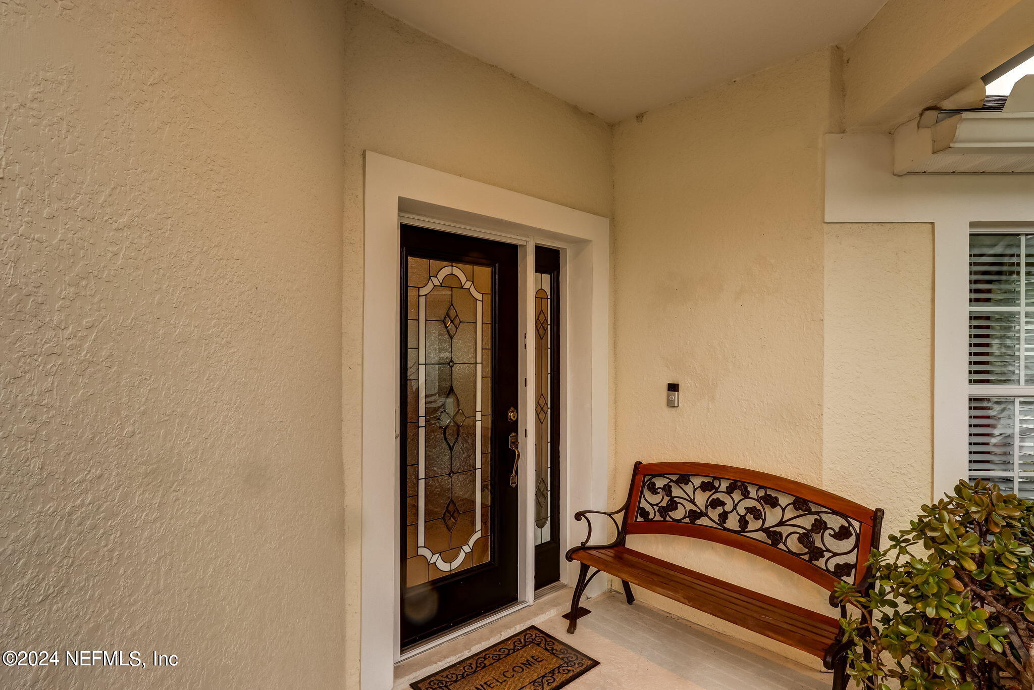 11230 Water Spring Circle Jacksonville, FL 32256 - Photo 6 of 91 a view of a room that has a bench in it