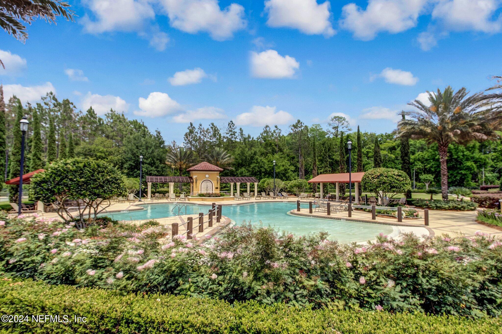 11230 Water Spring Circle Jacksonville, FL 32256 - Photo 74 of 91 a view of a swimming pool with a patio