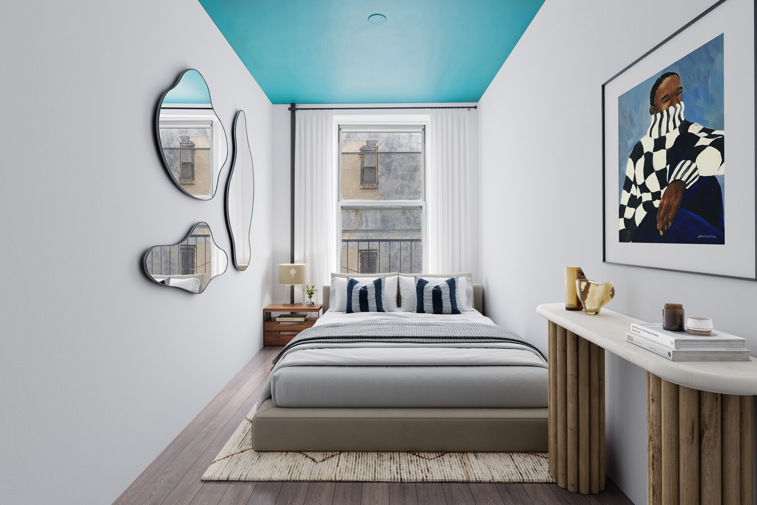 101 Thompson Street, Unit 19 Manhattan, NY 10012 - Photo 4 of 6 a bedroom with a large bed and a window