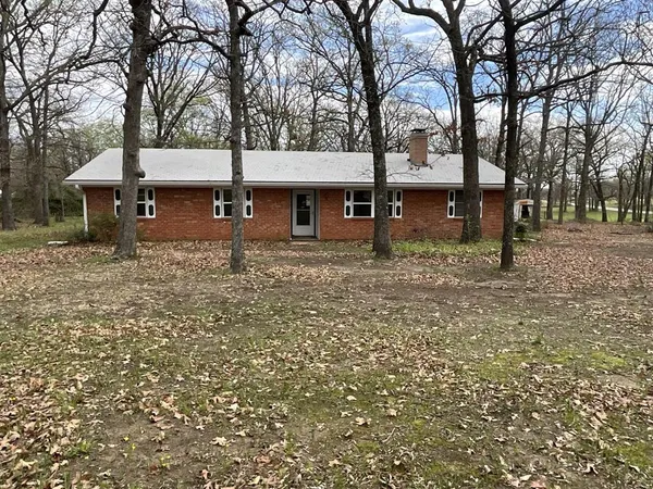 a house view with a backyard space