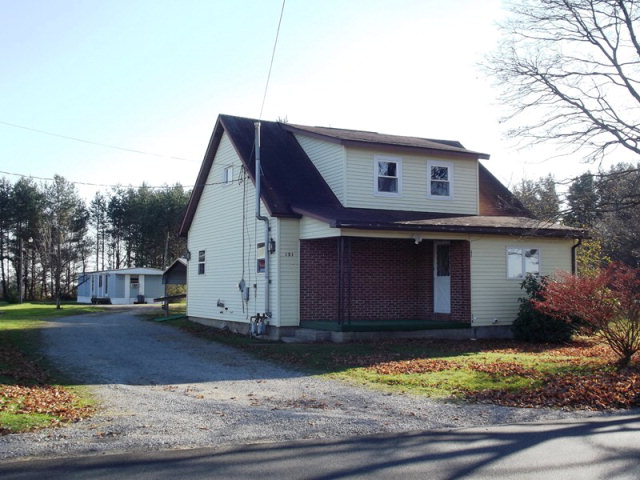 151 Ridge Avenue Strattanville, PA 16258 - Photo 1 of 1 a front view of house with yard