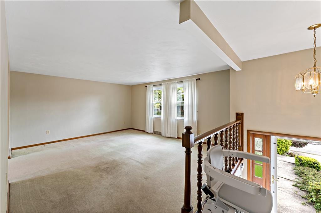 27 Dover Road Irwin, PA 15642 - Photo 6 of 43 a view of an empty room with a window