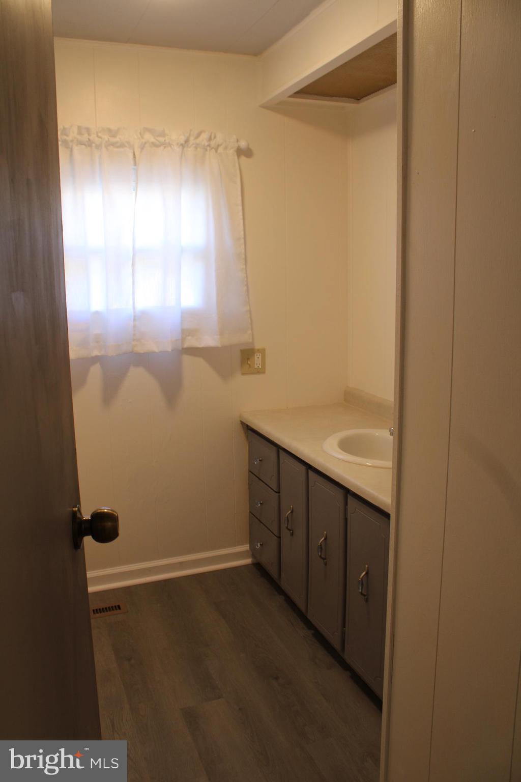 3730 Hunting Creek Road Huntingtown, MD 20639 - Photo 18 of 28 Hall bathroom