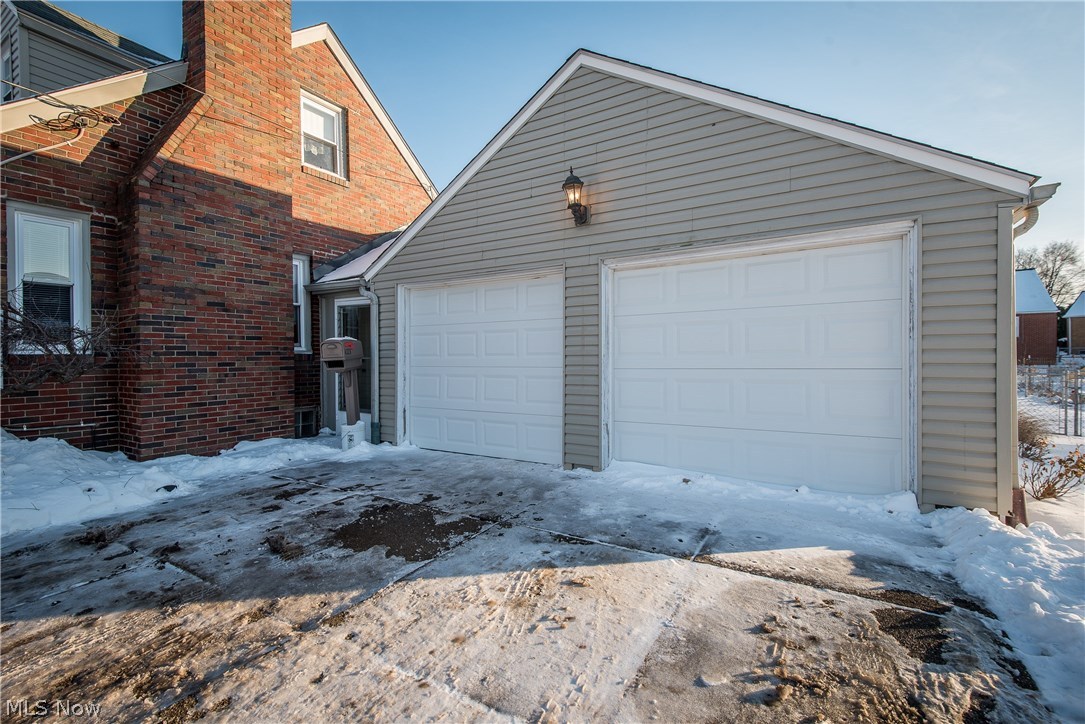 4328 7th Street Northwest Canton, OH 44708 - Photo 3 of 21 2 car attached garage leads to an enclosed breezeway
