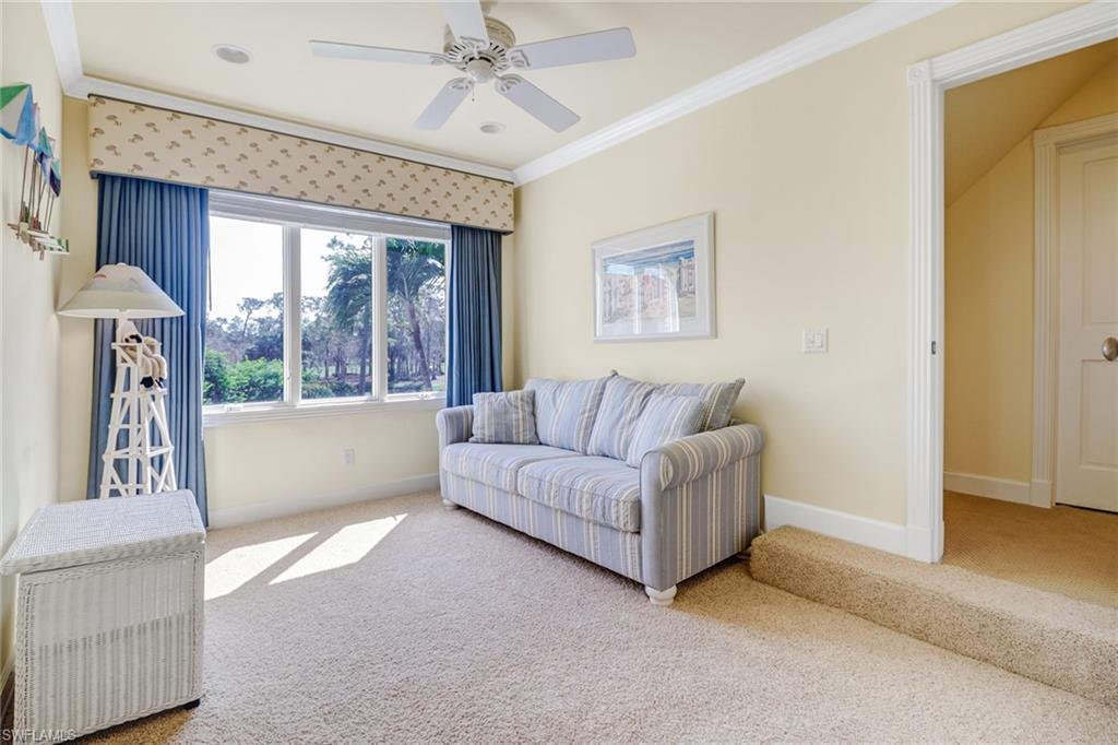 4556 Silver Fox Drive Naples, FL 34119 - Photo 15 of 22 a living room with furniture and a window