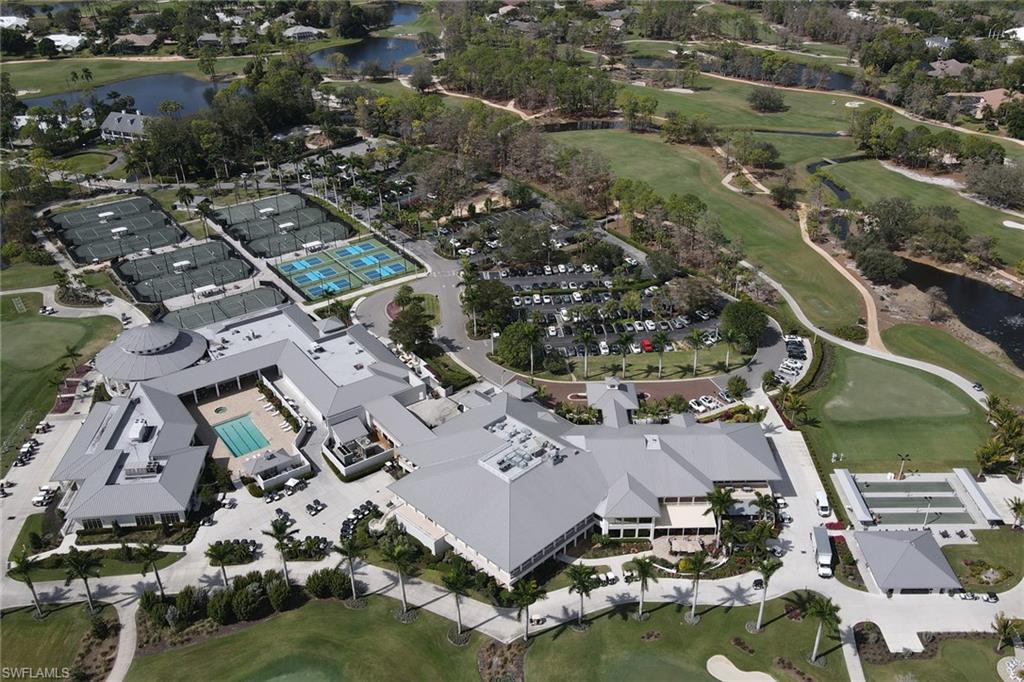 4556 Silver Fox Drive Naples, FL 34119 - Photo 22 of 22 an aerial view of residential houses with outdoor space
