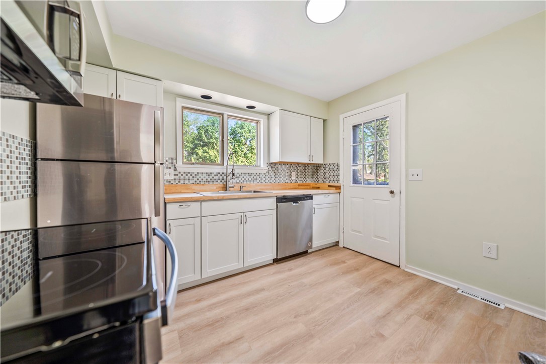 321 Eaglehead Road Perinton, NY 14445 - Photo 27 of 48 Secondary unit kitchen with new appliances