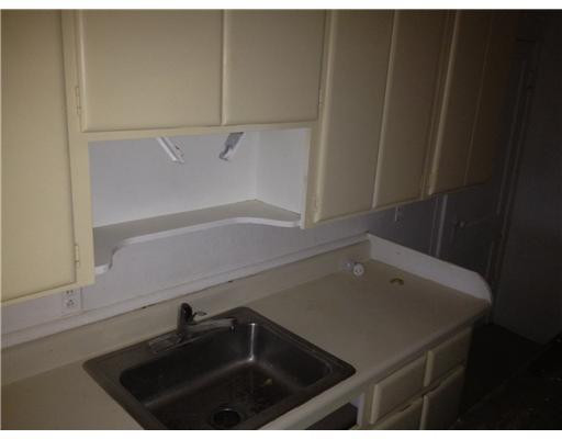 2097 Bacom Point Road Pahokee, FL 33476 - Photo 8 of 13 Kitchen