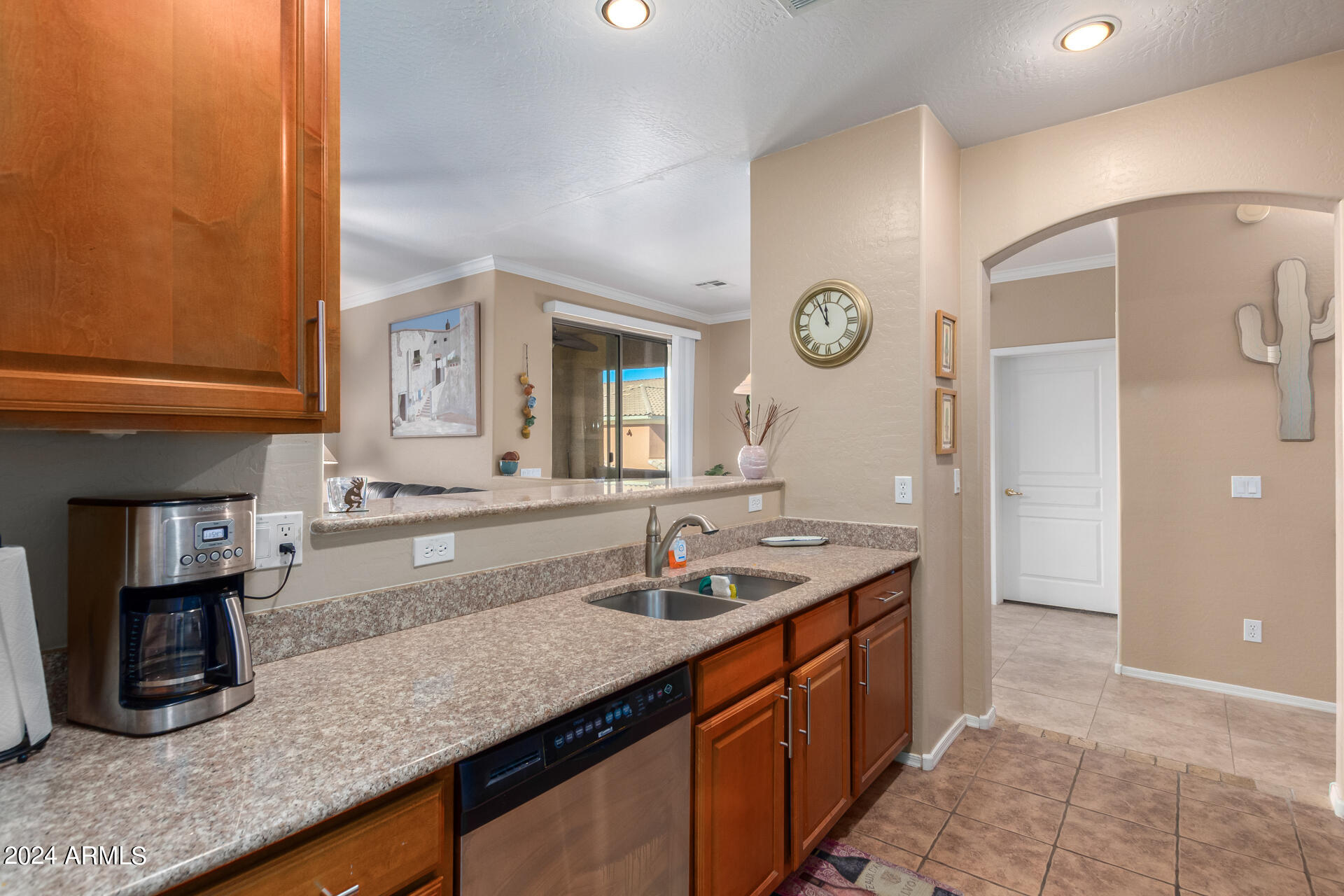 955 East Knox Road, Unit 244 Chandler, AZ 85225 - Photo 14 of 47 a kitchen with a sink and a refrigerator