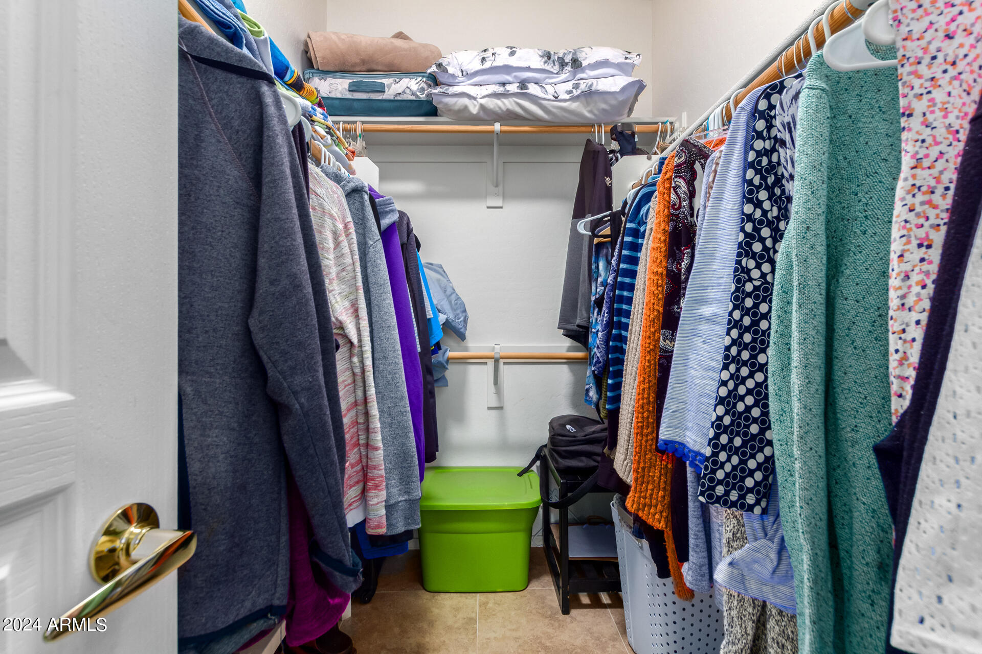 955 East Knox Road, Unit 244 Chandler, AZ 85225 - Photo 23 of 47 a view of walk in closet with clothes and shoes