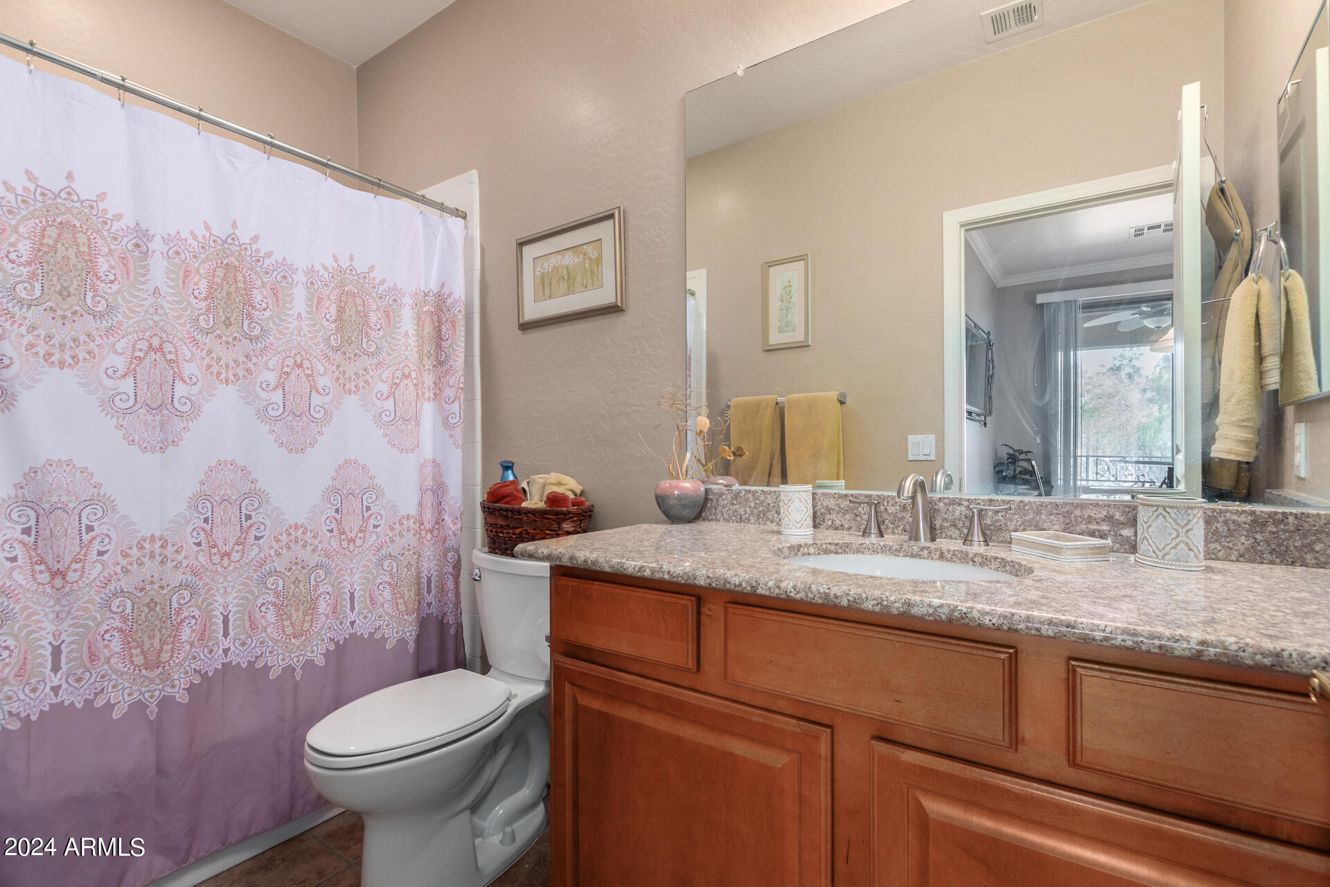 955 East Knox Road, Unit 244 Chandler, AZ 85225 - Photo 26 of 47 a bathroom with a granite countertop sink mirror vanity and toilet