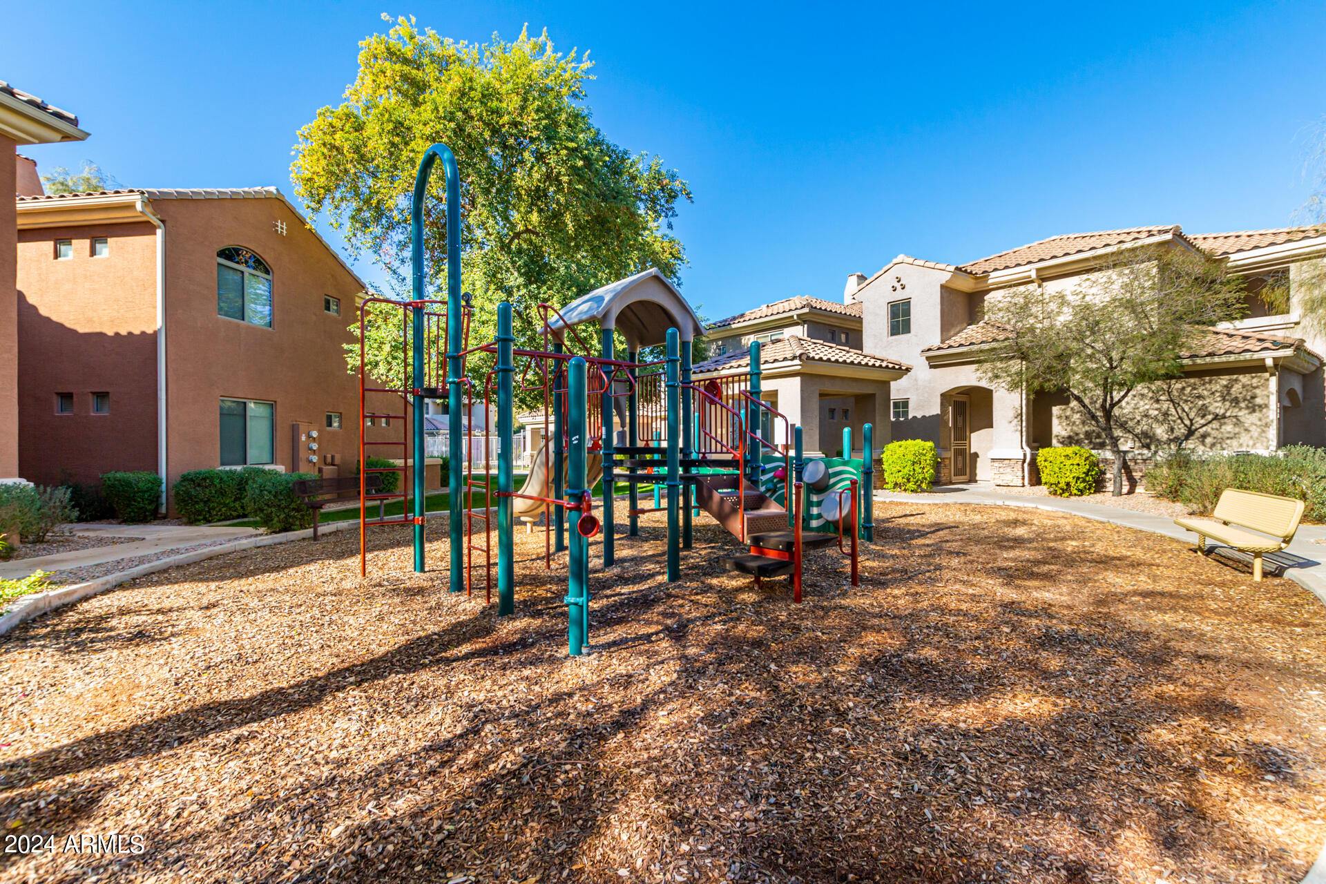 955 East Knox Road, Unit 244 Chandler, AZ 85225 - Photo 33 of 47 a view of a park with swings and slides