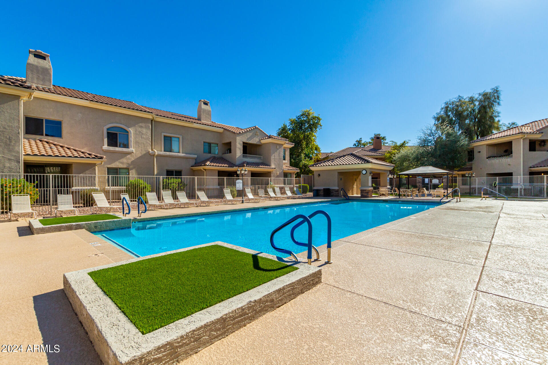 955 East Knox Road, Unit 244 Chandler, AZ 85225 - Photo 39 of 47 a view of a house with swimming pool