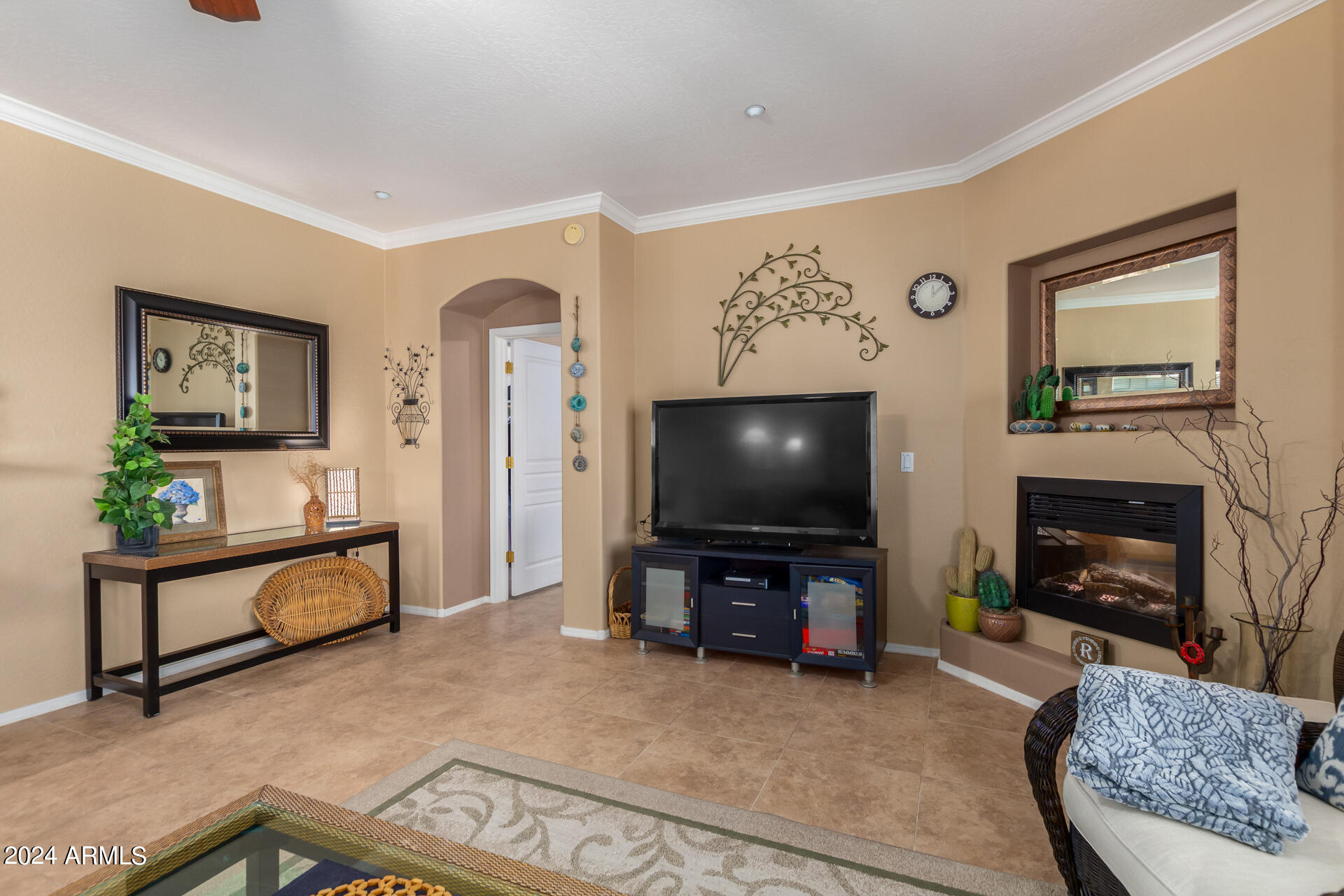 955 East Knox Road, Unit 244 Chandler, AZ 85225 - Photo 7 of 47 a living room with furniture and a flat screen tv