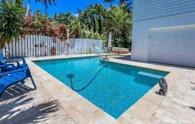 a view of a backyard with a small cabin