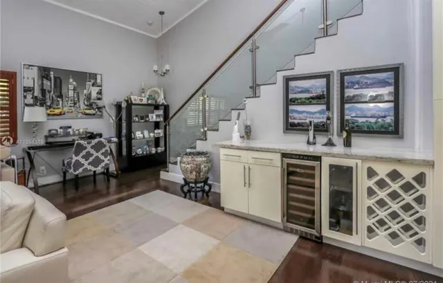 a view of a livingroom with furniture and window