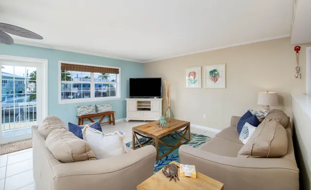 a house with swimming pool in front of it