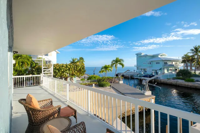 a view of a porch with furniture