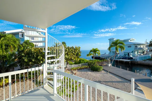 a view of a balcony with an outdoor space