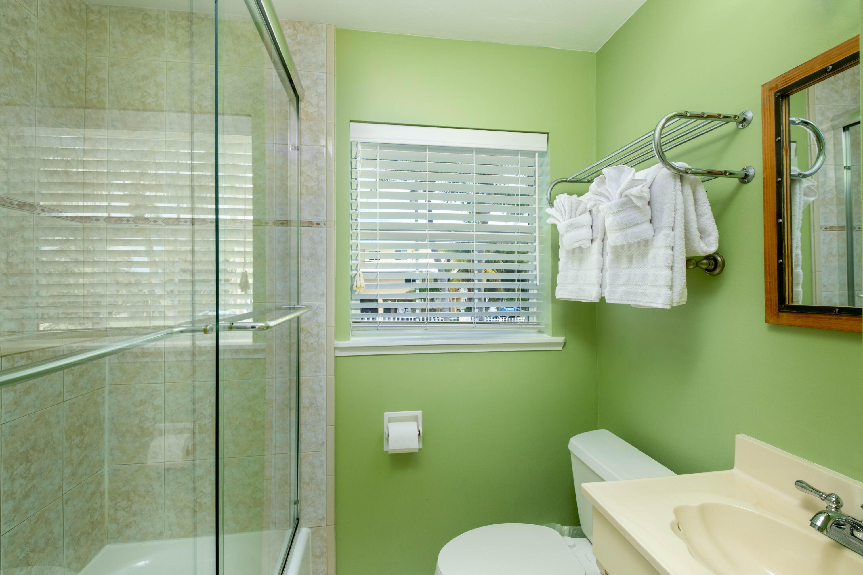 1202 Mockingbird Road Key Largo, FL 33037 - Photo 18 of 38 a bathroom with a toilet sink and tub