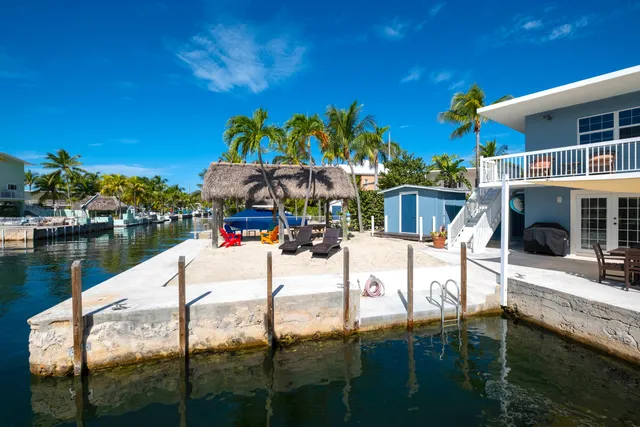a view of pool with outdoor seating