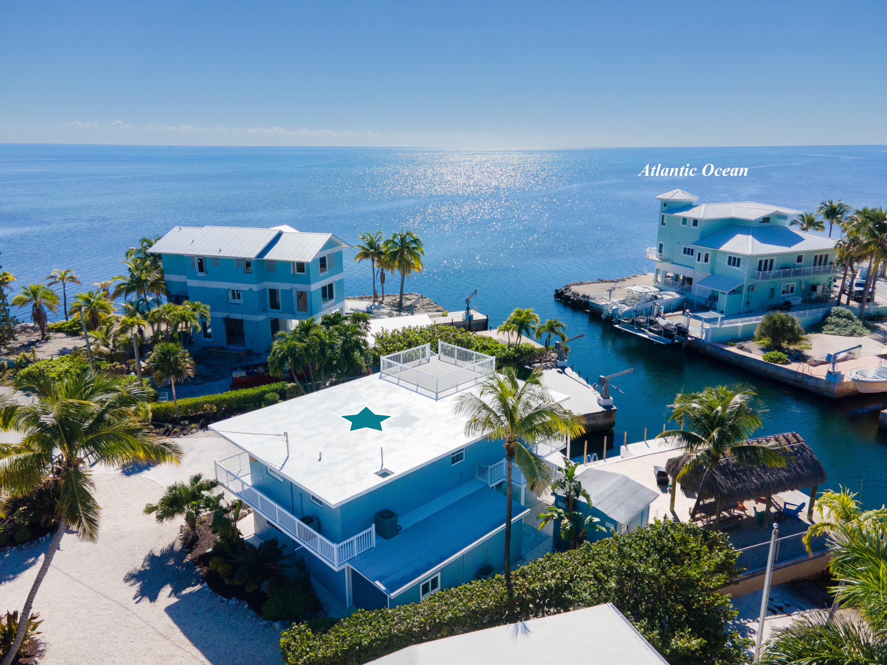 1202 Mockingbird Road Key Largo, FL 33037 - Photo 37 of 38 an aerial view of a house with a ocean view