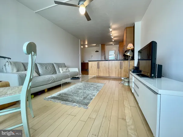 a living room with a couch and a flat screen tv