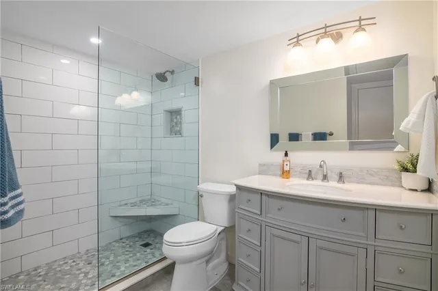 a workspace with furniture and mirror