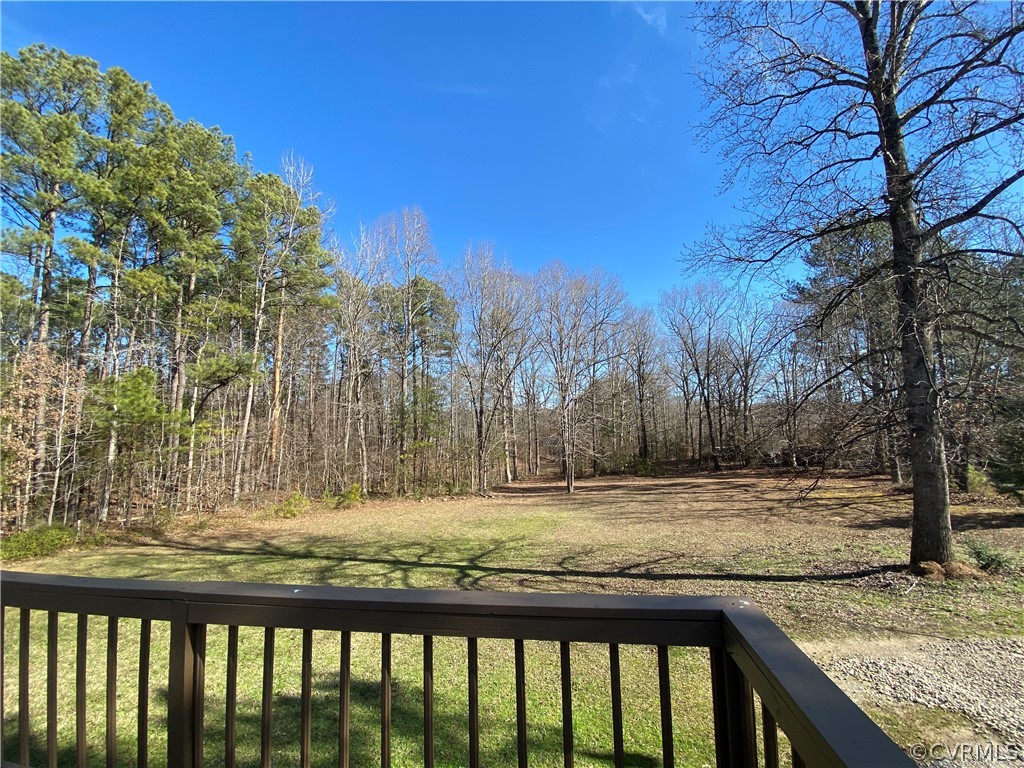 14619 Gatewood Road Dewitt, VA 23840 - Photo 12 of 14 a view of a yard with wooden fence