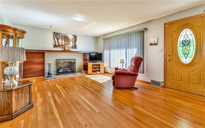 425 Thompson Run Road Pittsburgh, PA 15237 - Photo 2 of 24 Living room with plenty of light and beautiful hardwood floors.