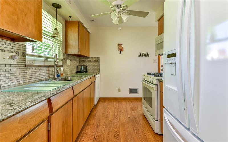 425 Thompson Run Road Pittsburgh, PA 15237 - Photo 7 of 24 Kitchen with granite counters and plenty of cabinets.