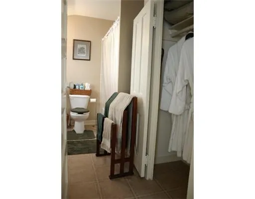 a view of a walk in closet and bedroom