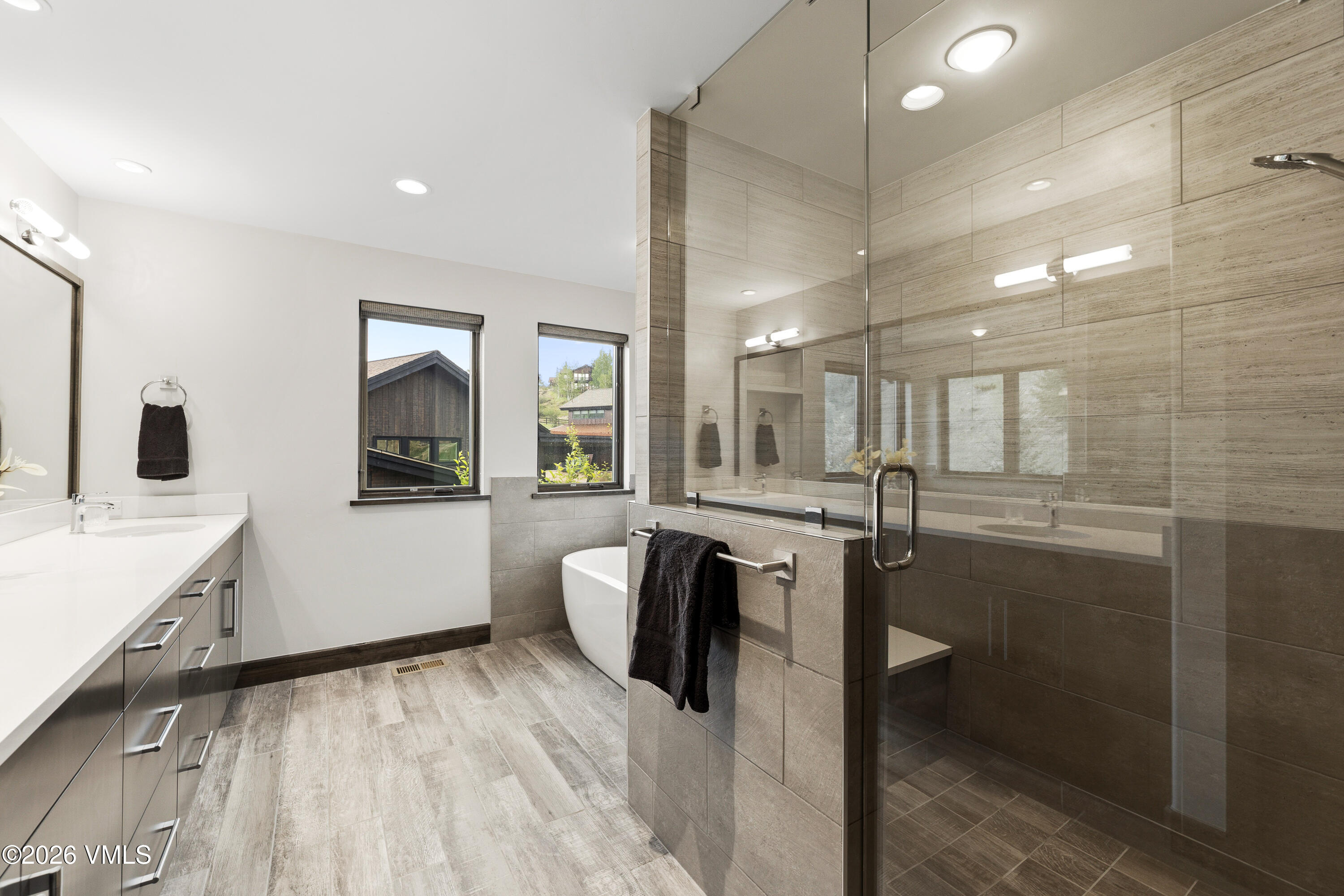 91 Edwards Pointe Edwards, CO 81632 - Photo 34 of 39 a bathroom with a sink and mirror with bathtub