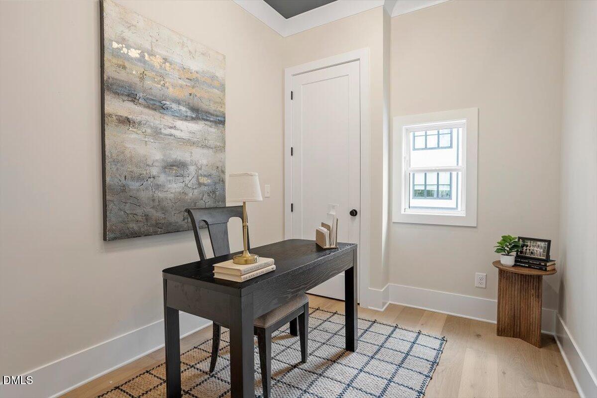 811 Maple Berry Lane, Unit 101 Raleigh, NC 27607 - Photo 20 of 45 a view of a workspace with furniture