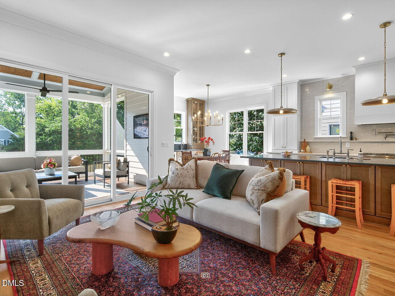 208 East Whitaker Mill Road Raleigh, NC 27608 - Photo 12 of 52 a living room with furniture and a large window