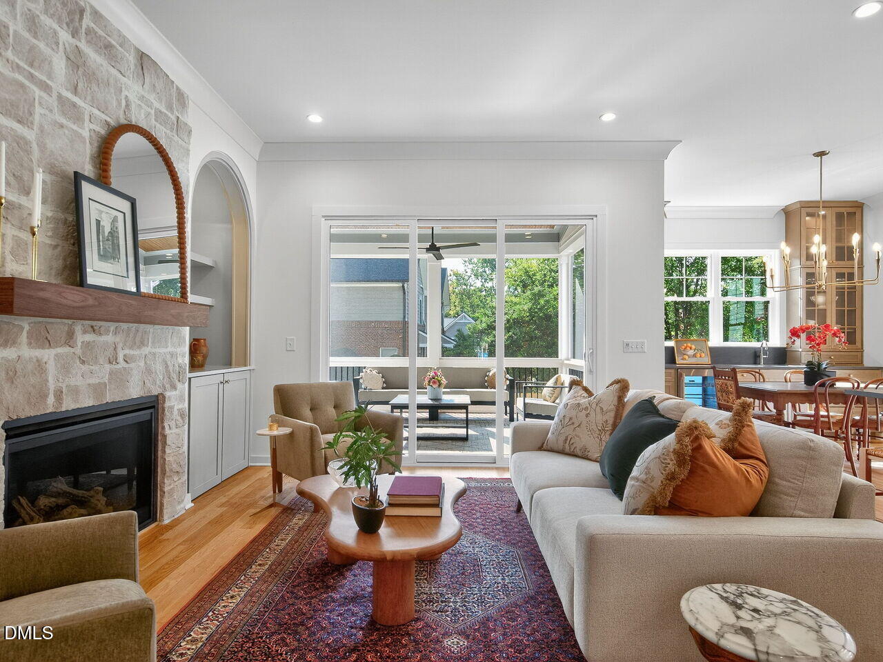 208 East Whitaker Mill Road Raleigh, NC 27608 - Photo 13 of 52 a living room with furniture fireplace and a large window