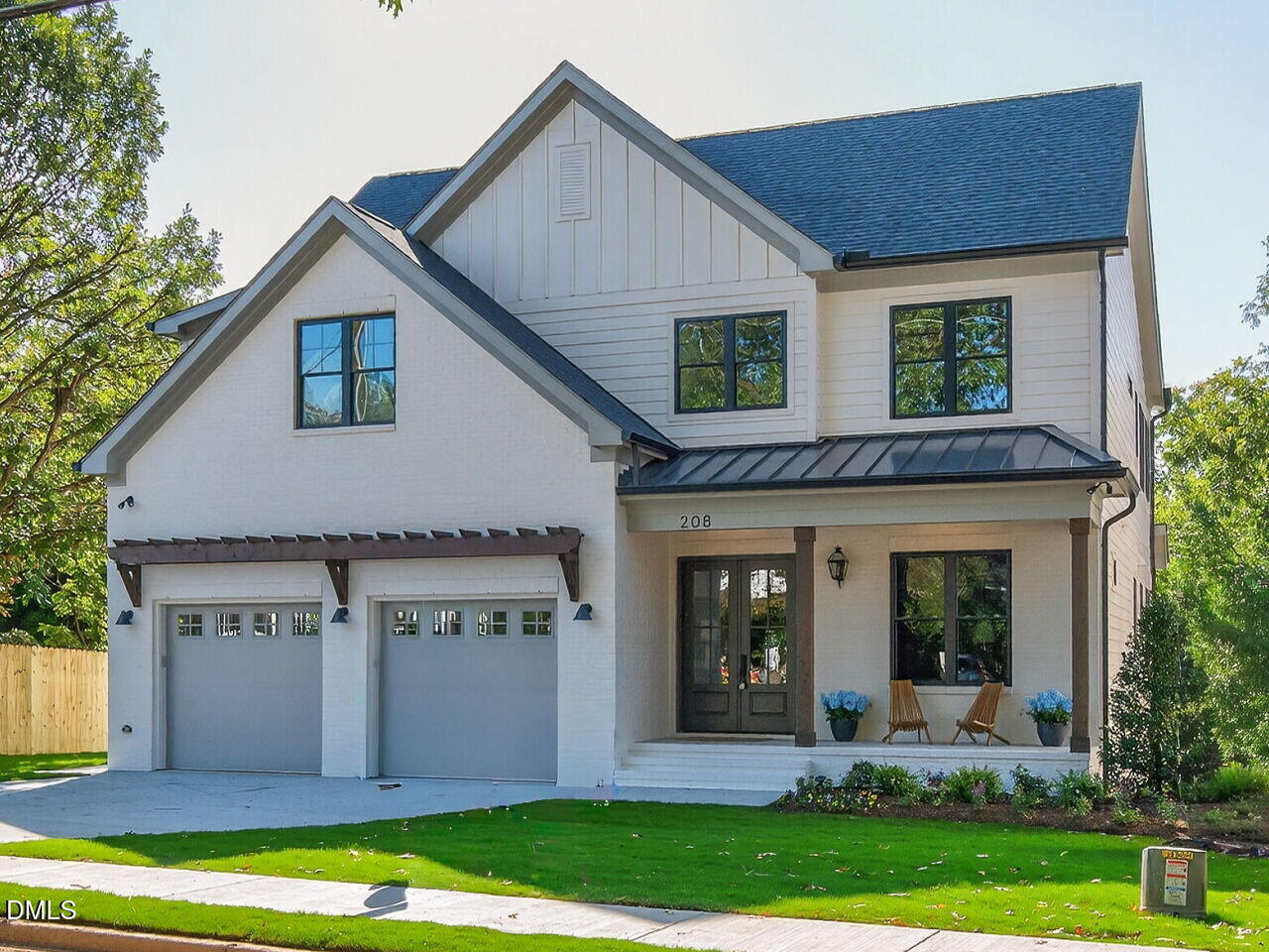 208 East Whitaker Mill Road Raleigh, NC 27608 - Photo 2 of 52 a view of a house with garden