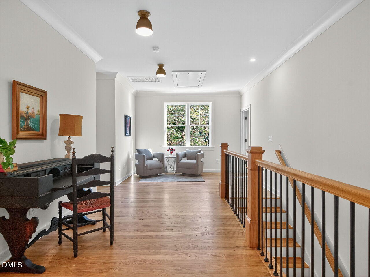 208 East Whitaker Mill Road Raleigh, NC 27608 - Photo 29 of 52 a living room with furniture fireplace and a window