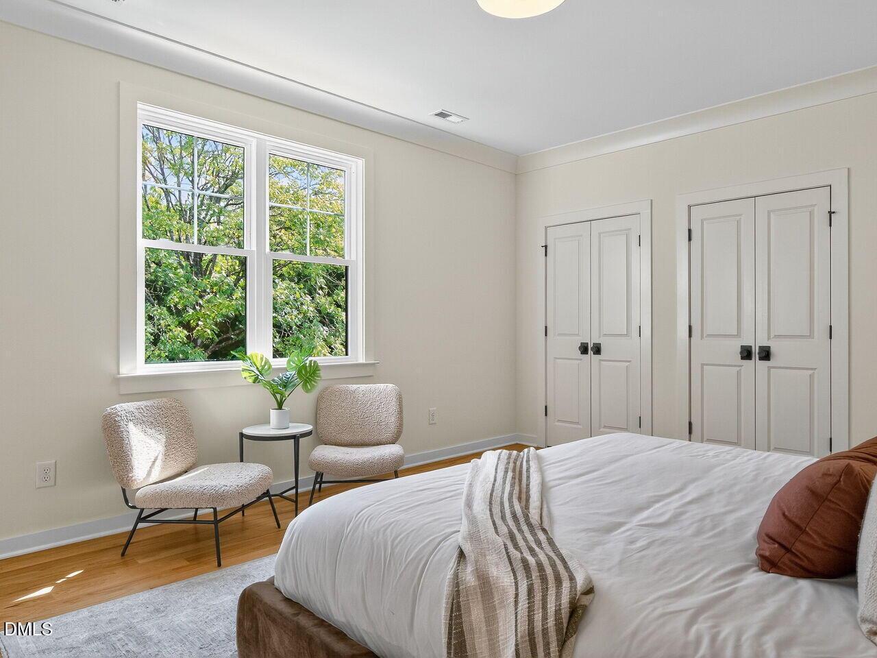 208 East Whitaker Mill Road Raleigh, NC 27608 - Photo 33 of 52 a bedroom with bed and a window