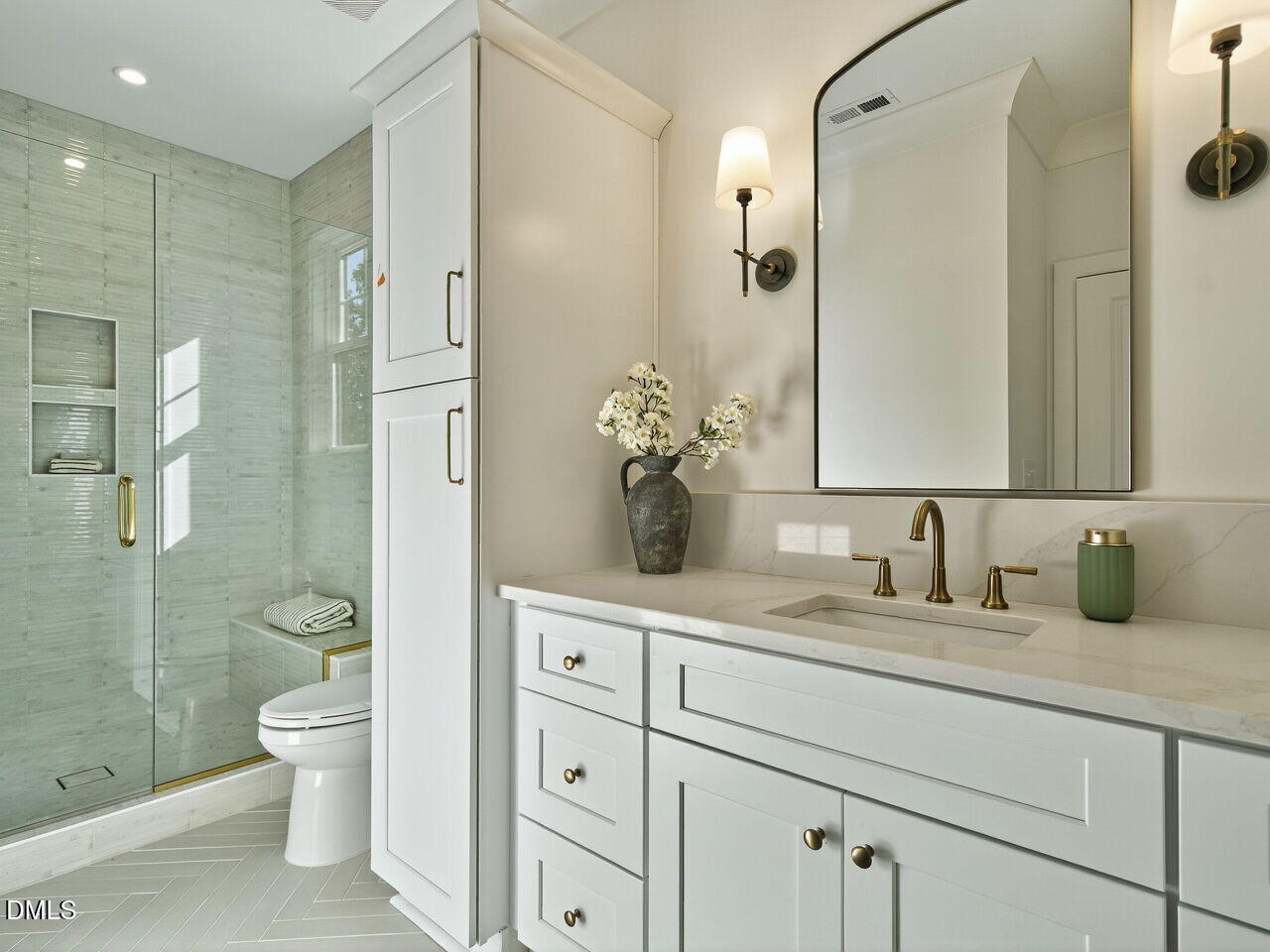 208 East Whitaker Mill Road Raleigh, NC 27608 - Photo 34 of 52 a bathroom with a granite countertop sink a toilet and a mirror
