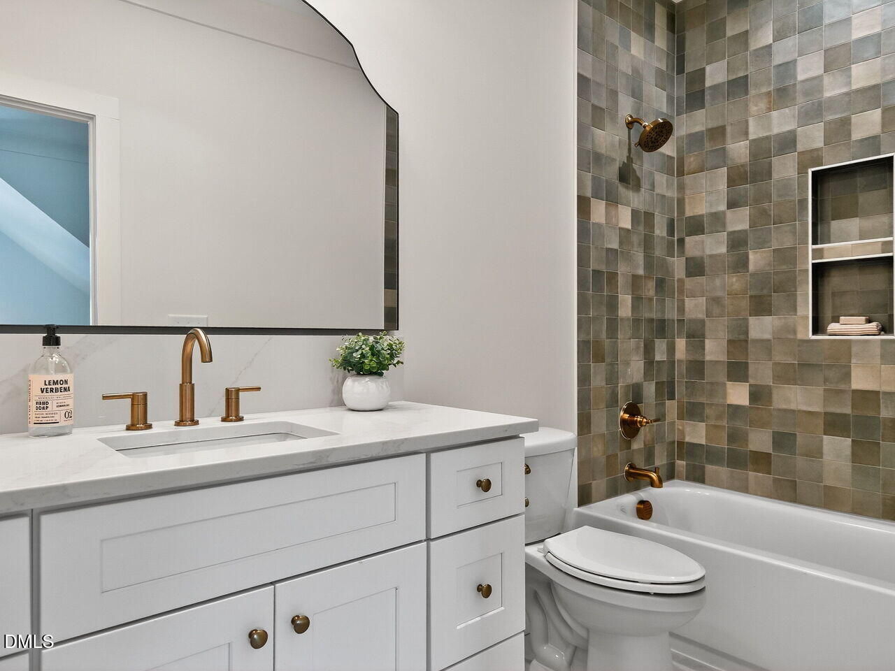 208 East Whitaker Mill Road Raleigh, NC 27608 - Photo 38 of 52 a bathroom with a granite countertop sink toilet mirror and shower