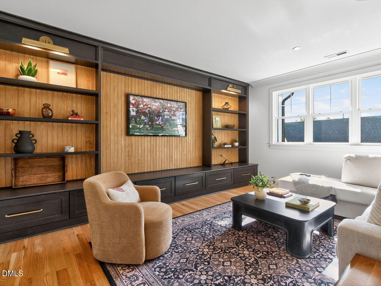 208 East Whitaker Mill Road Raleigh, NC 27608 - Photo 41 of 52 a living room with furniture and a window