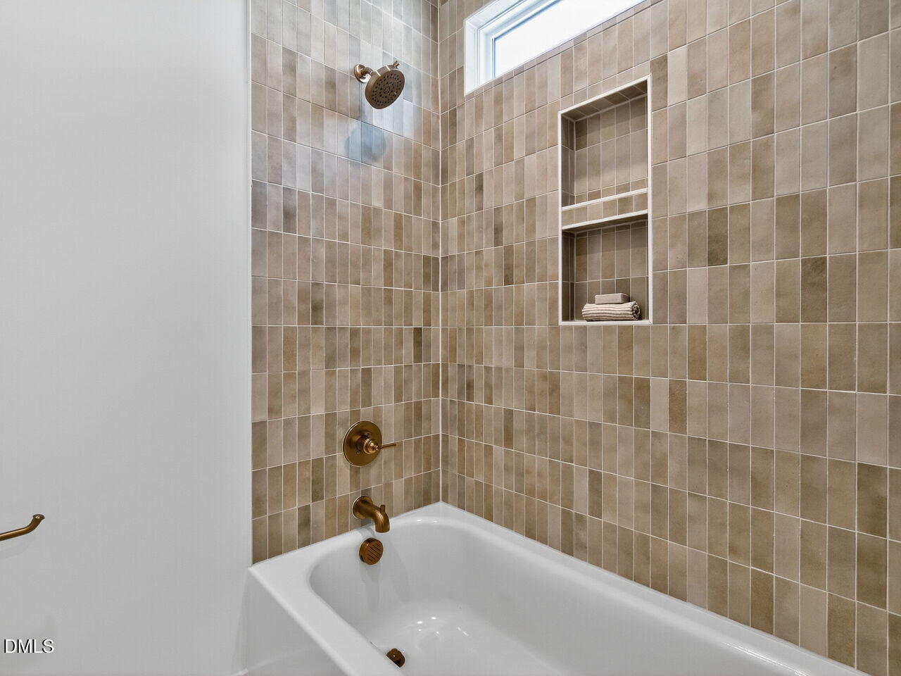 208 East Whitaker Mill Road Raleigh, NC 27608 - Photo 42 of 52 a bathroom with a sink and shower