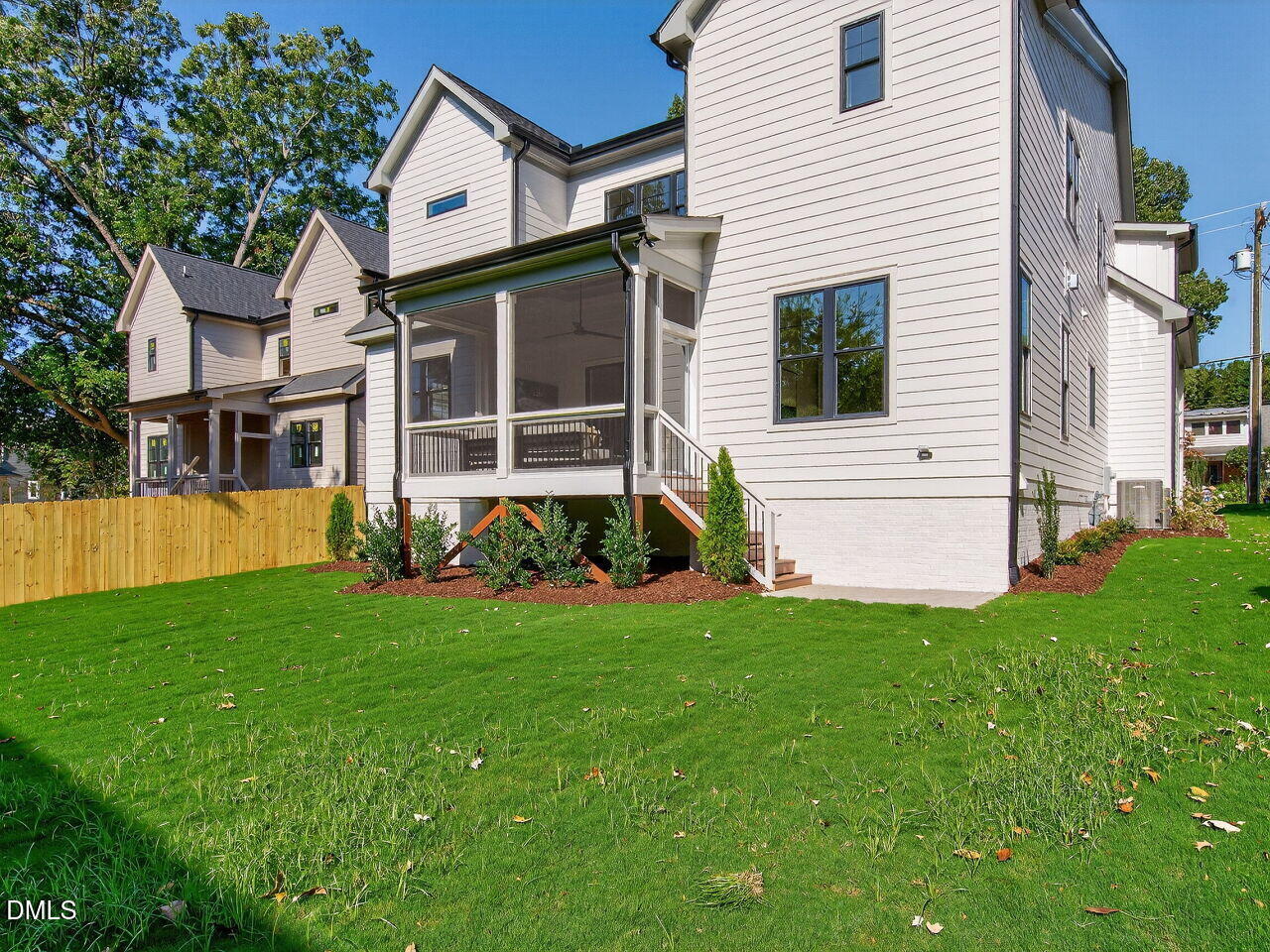 208 East Whitaker Mill Road Raleigh, NC 27608 - Photo 51 of 52 a front view of a house with a yard and porch